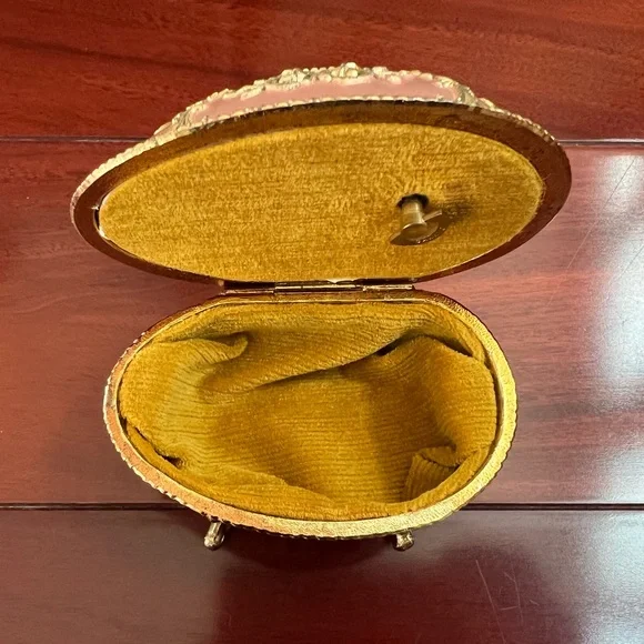 Vintage Sankyo Gold Tone Enamel Footed Egg Shape Trinket Music Box